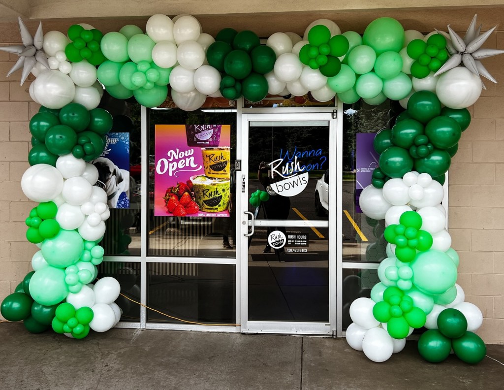 Corporate balloons in Boulder for a business grand opening celebration.