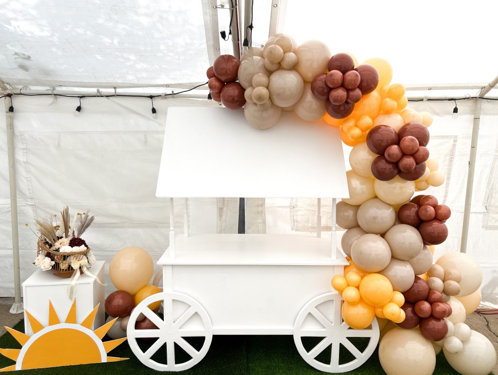 Chuchi's Events popular candy cart rental, perfect for parties and events in Denver. This stylish white cart offers a charming display for sweet treats, making it a favorite for birthdays, weddings, and special celebrations. Versatile and customizable to match any theme, the candy cart / dessert cart adds a touch of elegance and fun to any event.