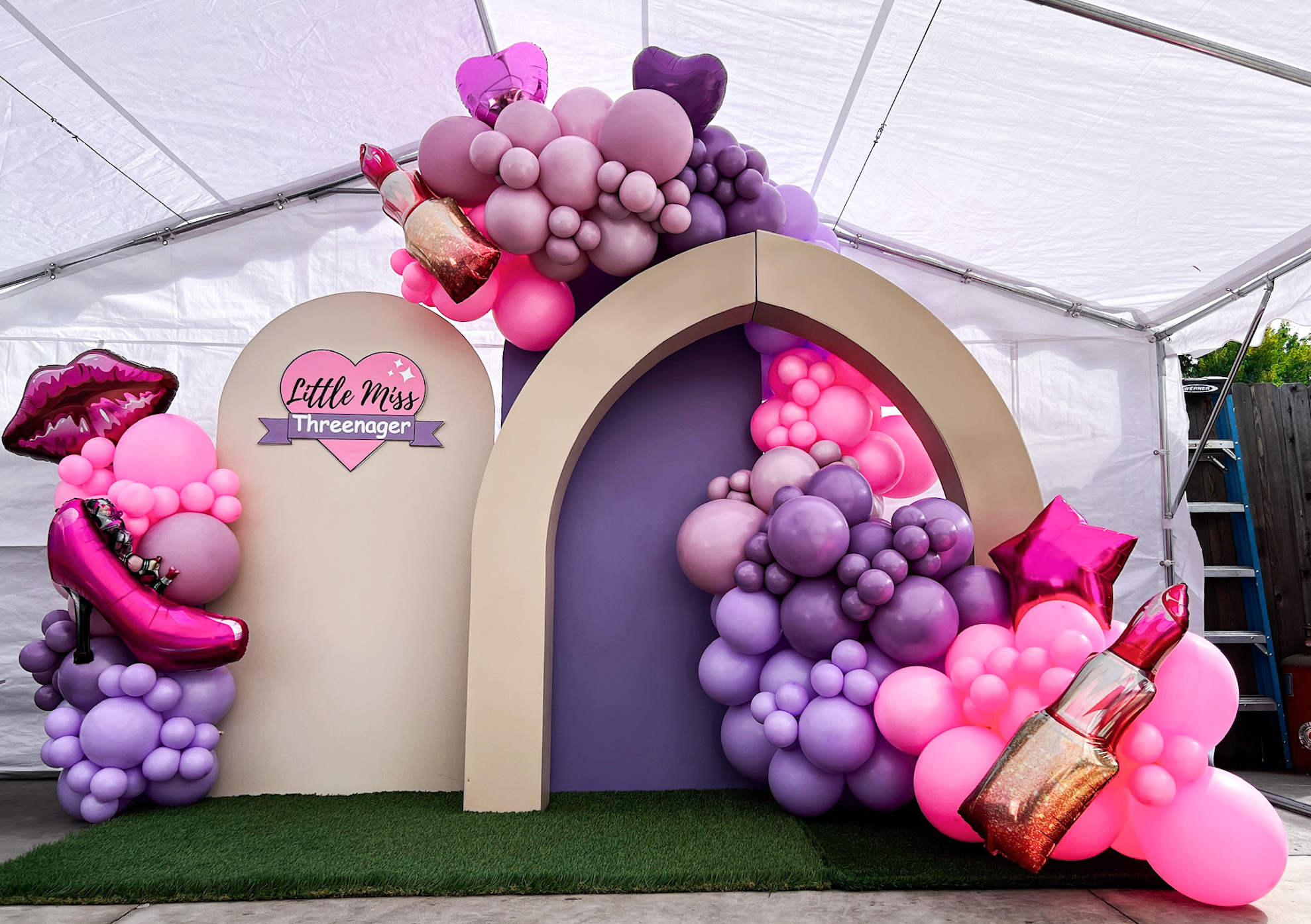 Denver custom backdrop rentals with balloon garland installation by Chuchi's Events