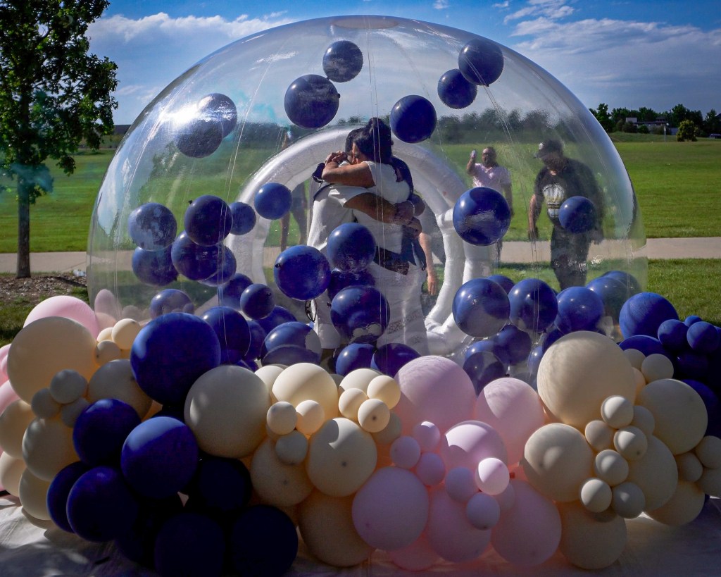 Bubble House rental in the denver metro area used for a gender reveal in Aurora, Colorado. Unique and viral, filled with custom balloons