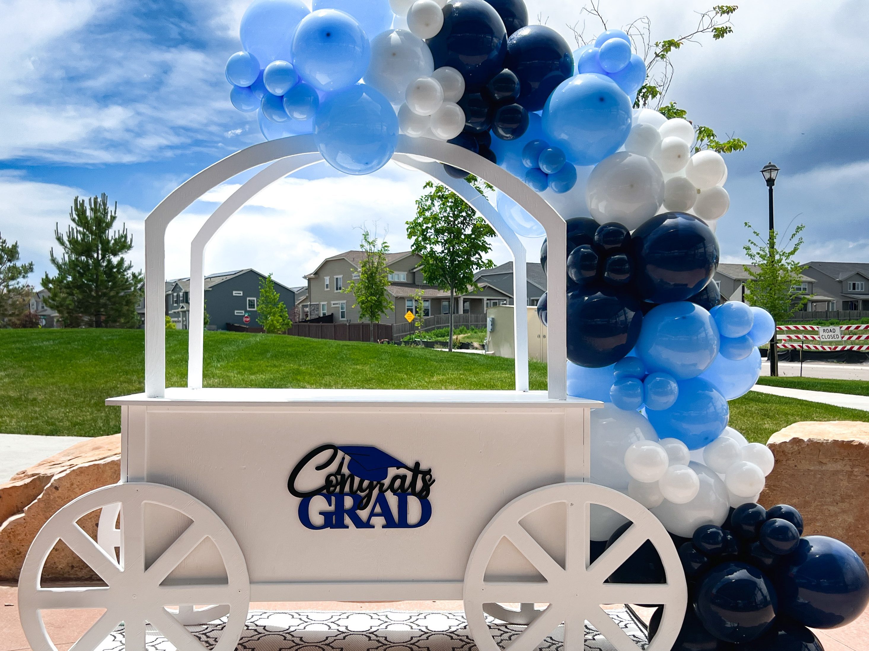 Luxury white candy cart rental for parties and events in Denver – perfect for birthdays, weddings, and baby showers by Chuchi's Events.