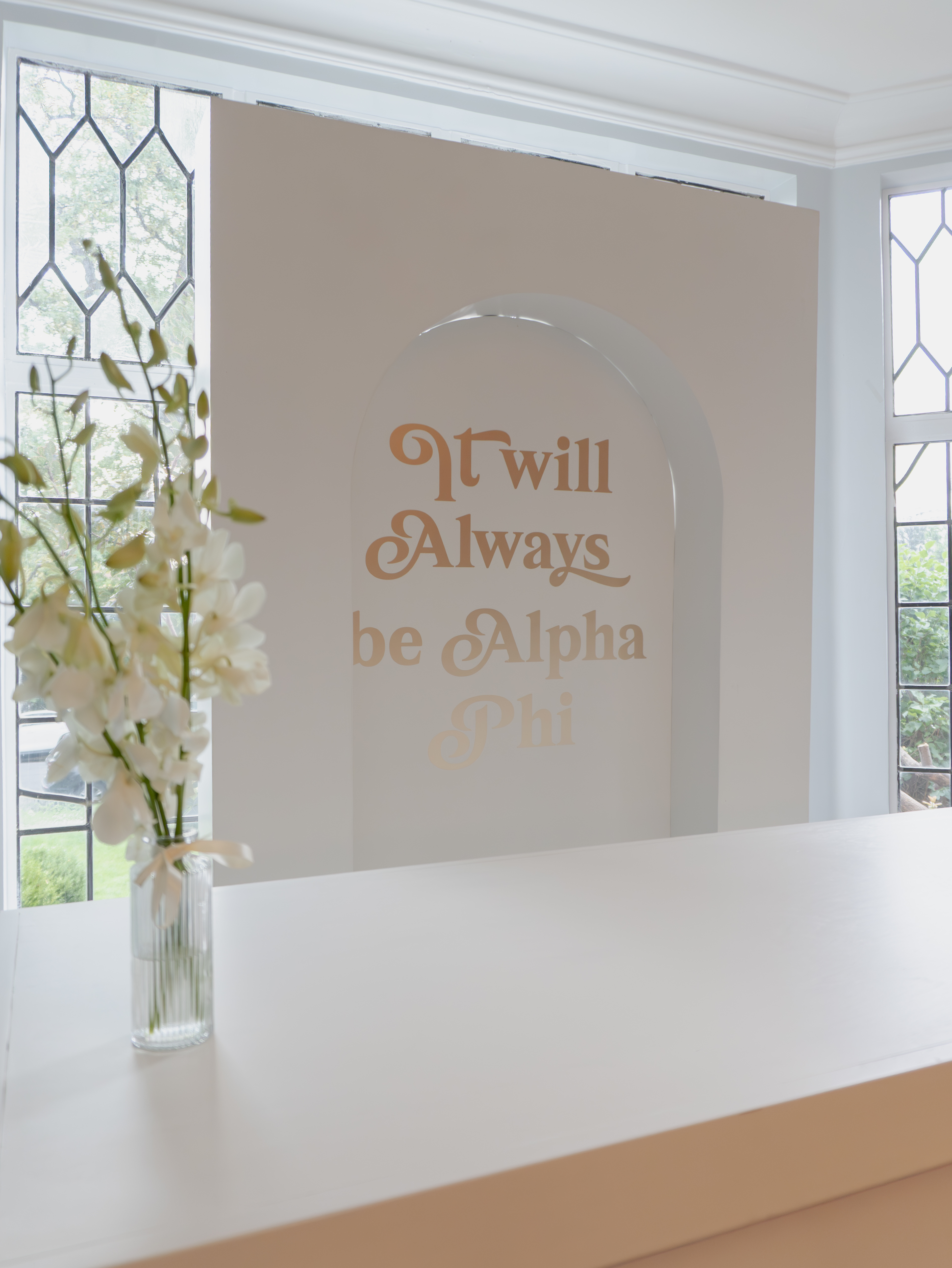 Denver event rental setup with open arch backdrop, statement bar, and 3D box cover arch — versatile for weddings, gender reveals, or corporate branding.